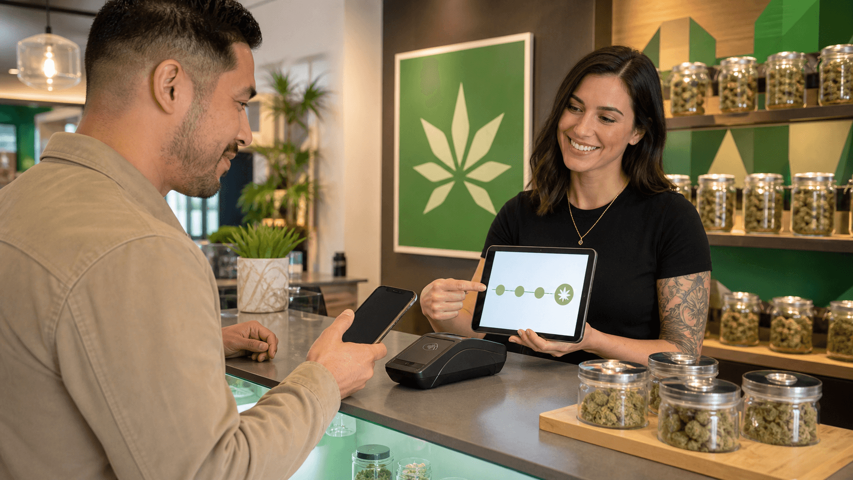 Green cannabis leaves beside a smartphone loyalty screen with bright charts on a dark teal background